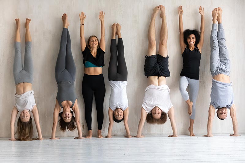 Teens positioned against wall