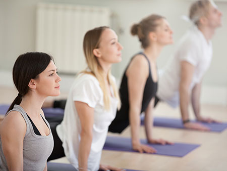 13 -15 year olds enjoying yoga classes